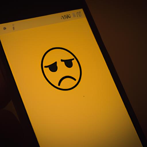 A person holding an iPhone with the depressed sad emoji on the screen, reflecting the mood of the conversation.